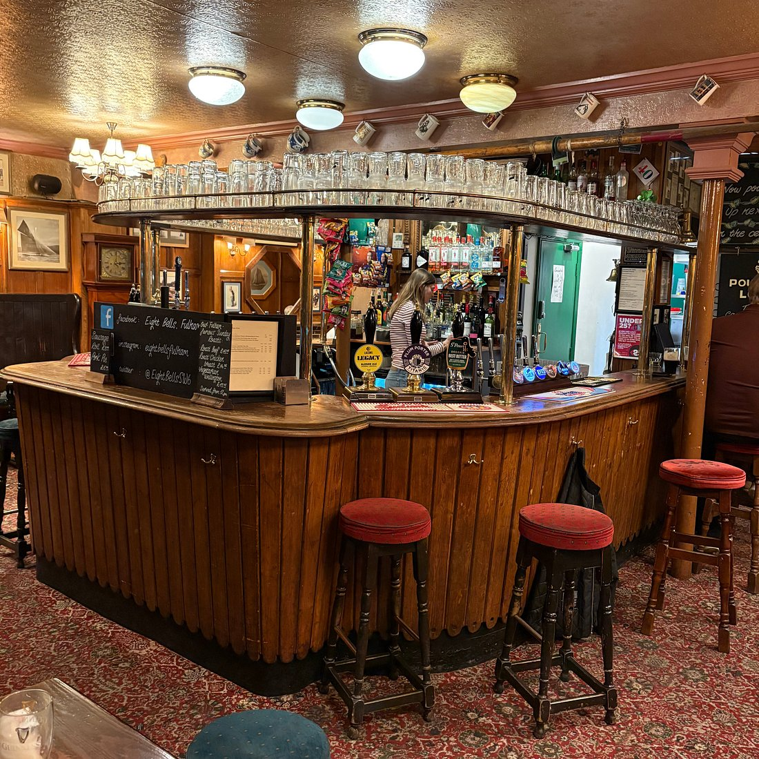 The horseshoe bar at The Eight Bells, Fulham