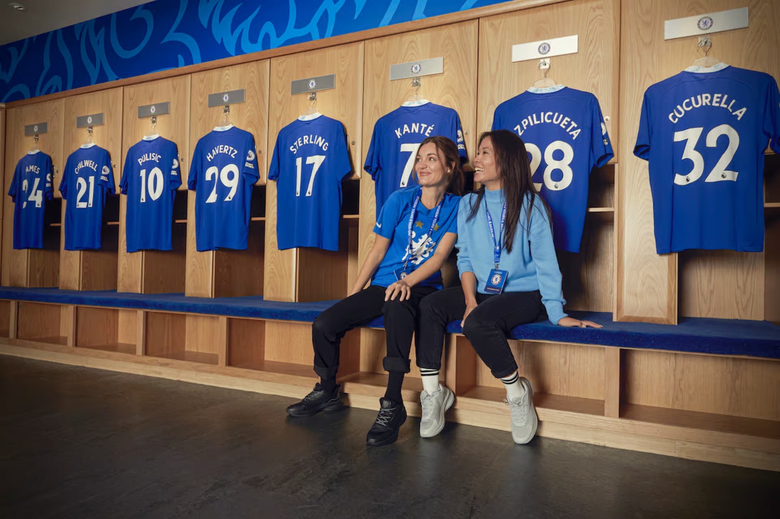 Fans in the Chelsea home dressing room with player shirts hung above