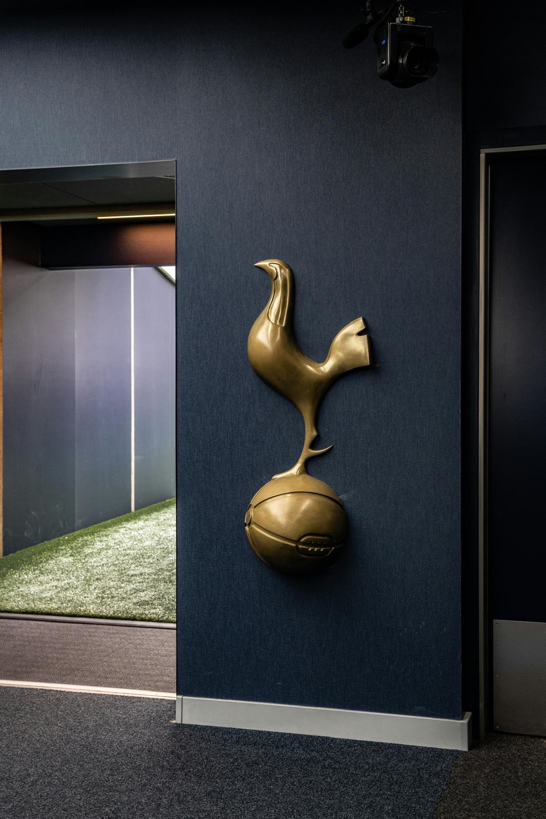 Golden cockerel emblem inside Tottenham Hotspur Stadium