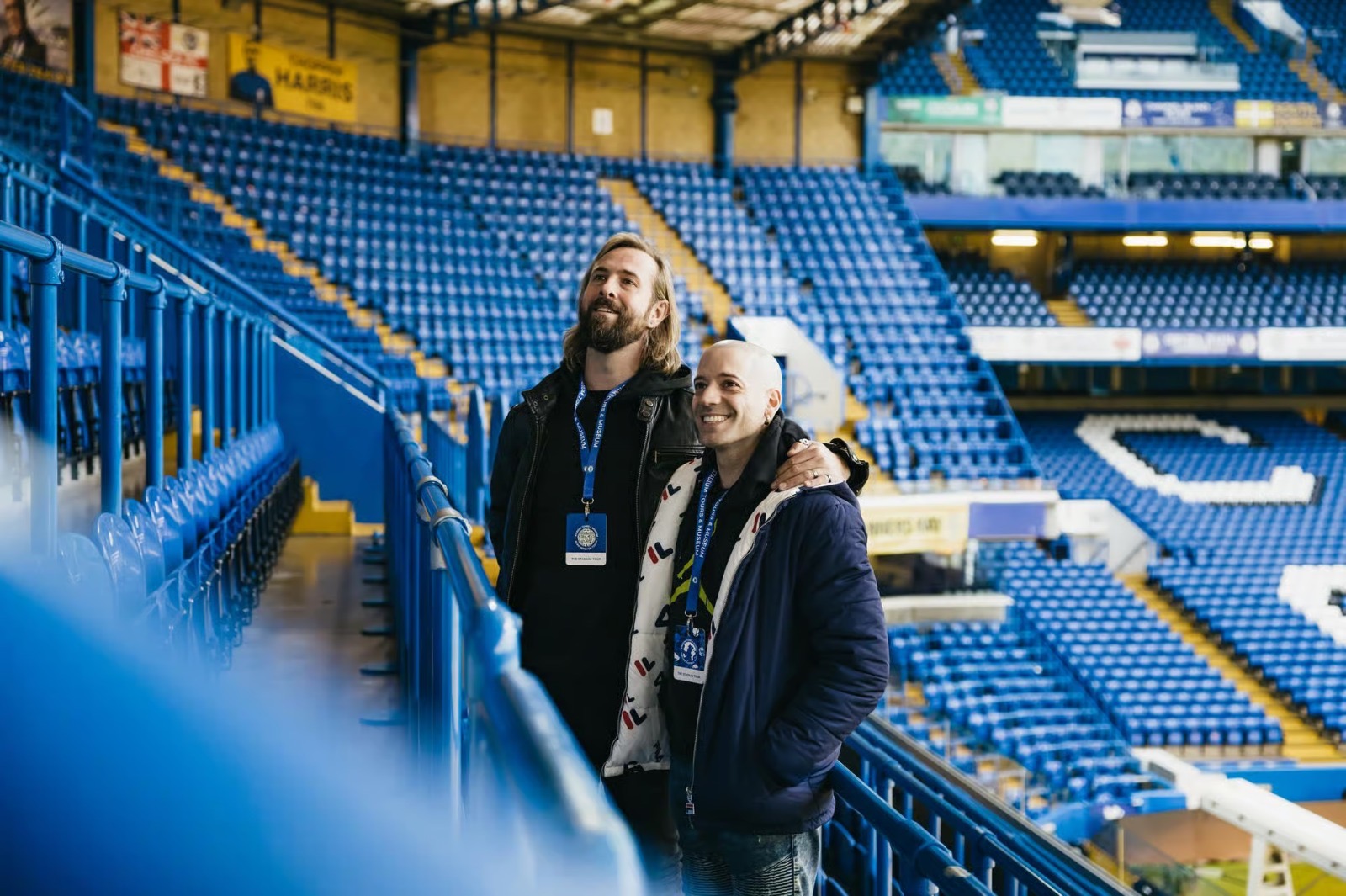 Two fans on the Stamford Bridge stand during the Chelsea stadium tour